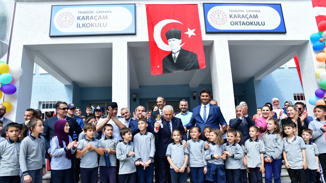 ÇAYKARA KARAÇAM İLK VE ORTAOKULUNUN AÇILIŞI VALİ AZİZ YILDIRIM'IN KATILIMIYLA GERÇEKLEŞTİRİLDİ.